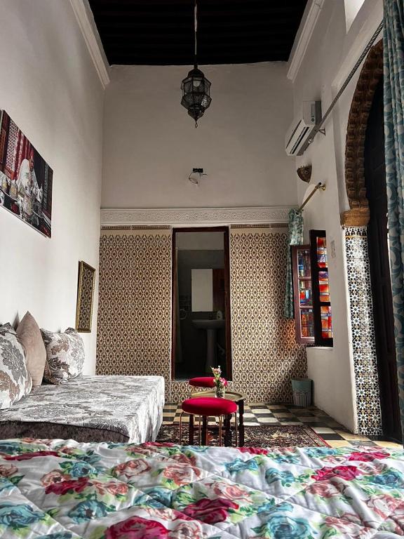 Postel nebo postele na pokoji v ubytování Riad Palais D'Or