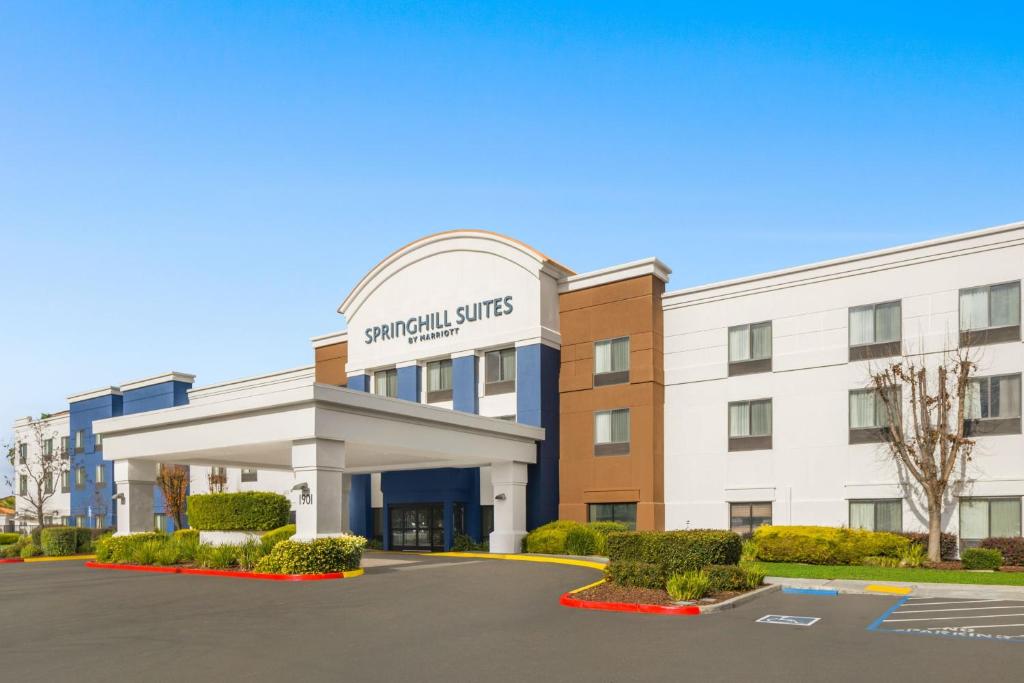 a rendering of the front of a cranberry hotel at SpringHill Suites by Marriott Modesto in Modesto