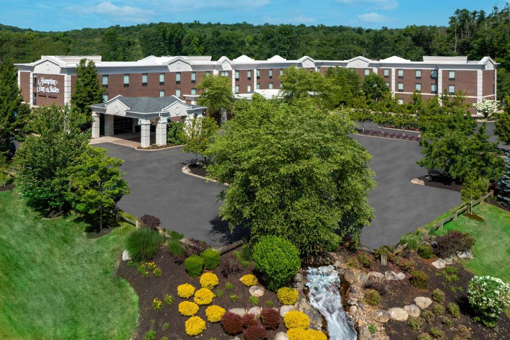 an aerial view of a building with a garden at Hampton Inn and Suites Hartford/Farmington in Farmington