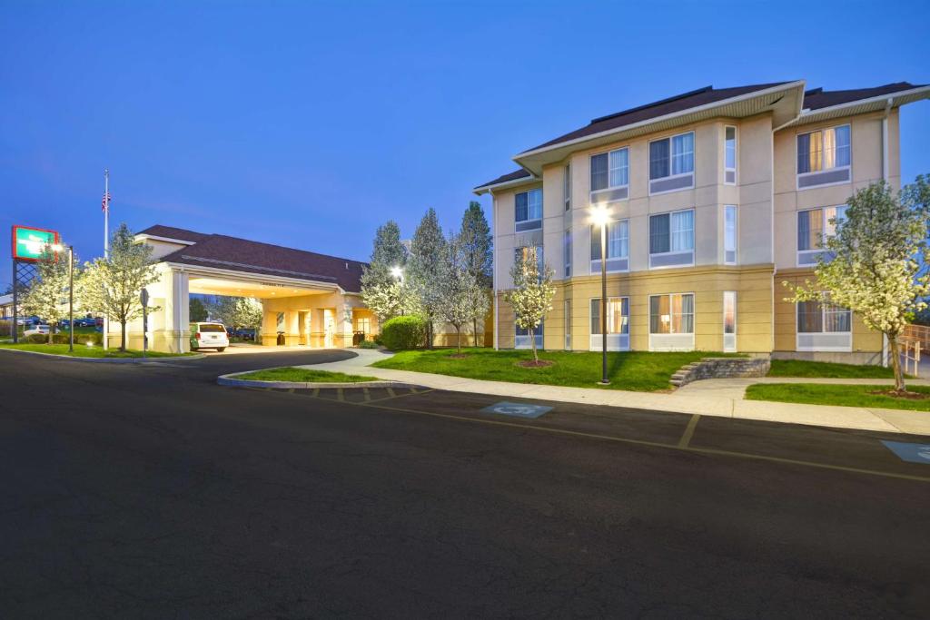 an empty street in front of a building at The Homewood Suites by Hilton Ithaca in Ithaca