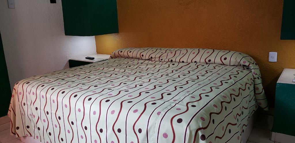Postel nebo postele na pokoji v ubytování Hotel Viena