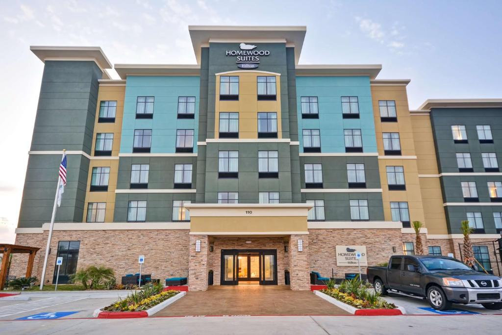 a rendering of the front of a building at Homewood Suites By Hilton Galveston in Galveston