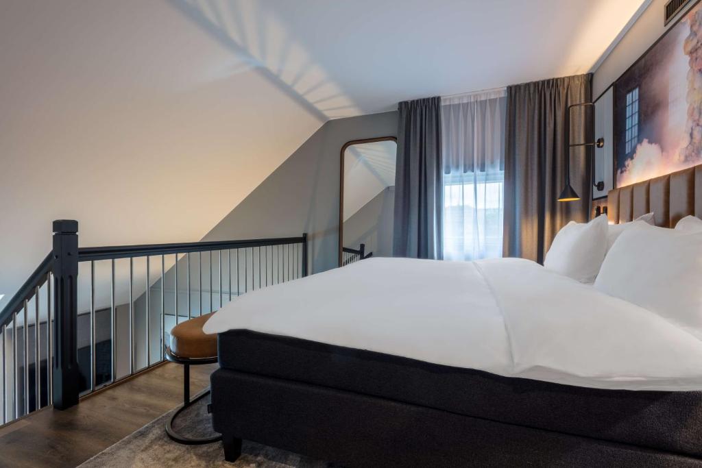 Postel nebo postele na pokoji v ubytování Radisson Blu Royal Garden Hotel, Trondheim