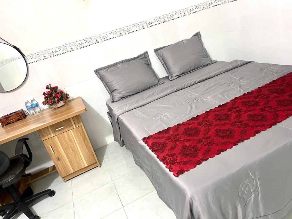 Postel nebo postele na pokoji v ubytování Motel An Bình