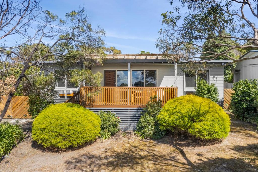 a home with bushes in front of it at Torquay Boulevard Beach House in Torquay