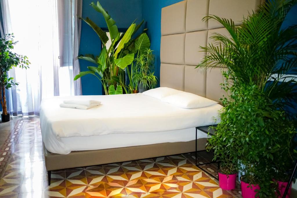 Postel nebo postele na pokoji v ubytování Valhalla Boutique Hotel