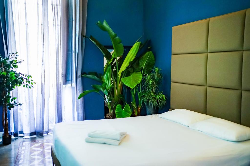 Postel nebo postele na pokoji v ubytování Valhalla Boutique Hotel