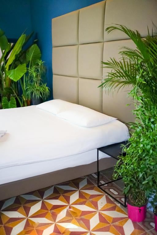 Postel nebo postele na pokoji v ubytování Valhalla Boutique Hotel