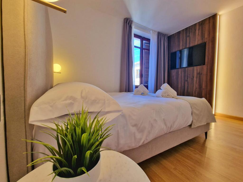 Postel nebo postele na pokoji v ubytování HOSTAL HS CEHEGIN