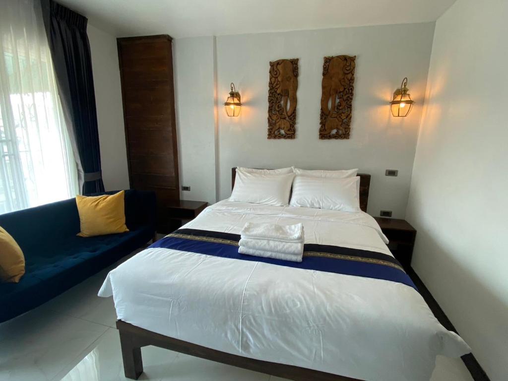 Postel nebo postele na pokoji v ubytování Lemon Guesthouse