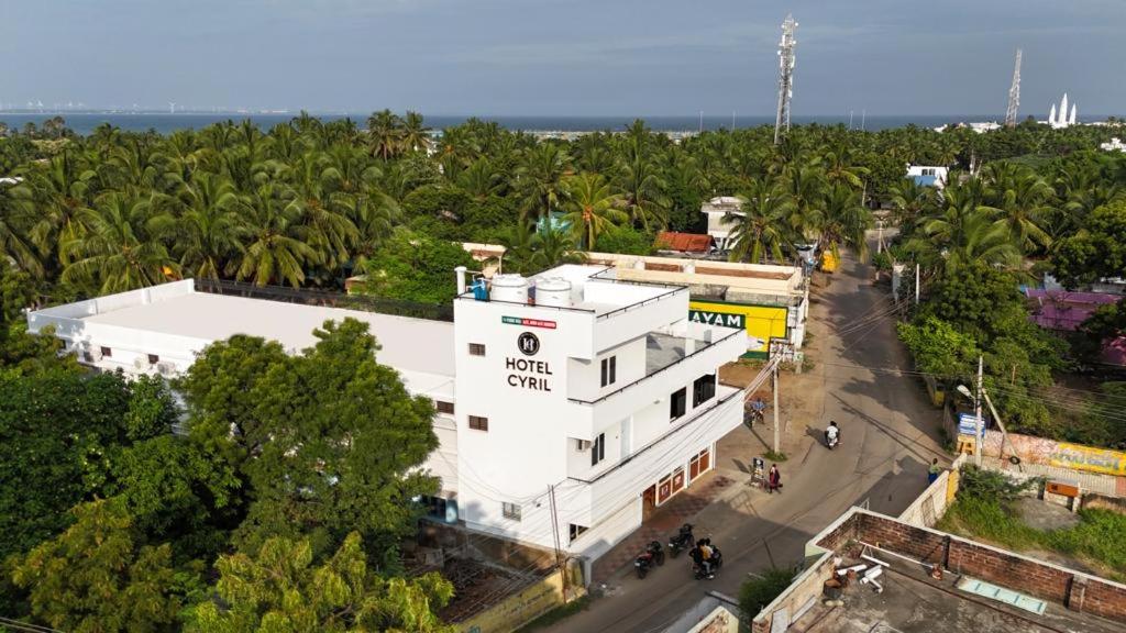an aerial view of a city with a white building at HOTEL CYRIL in Kanyakumari