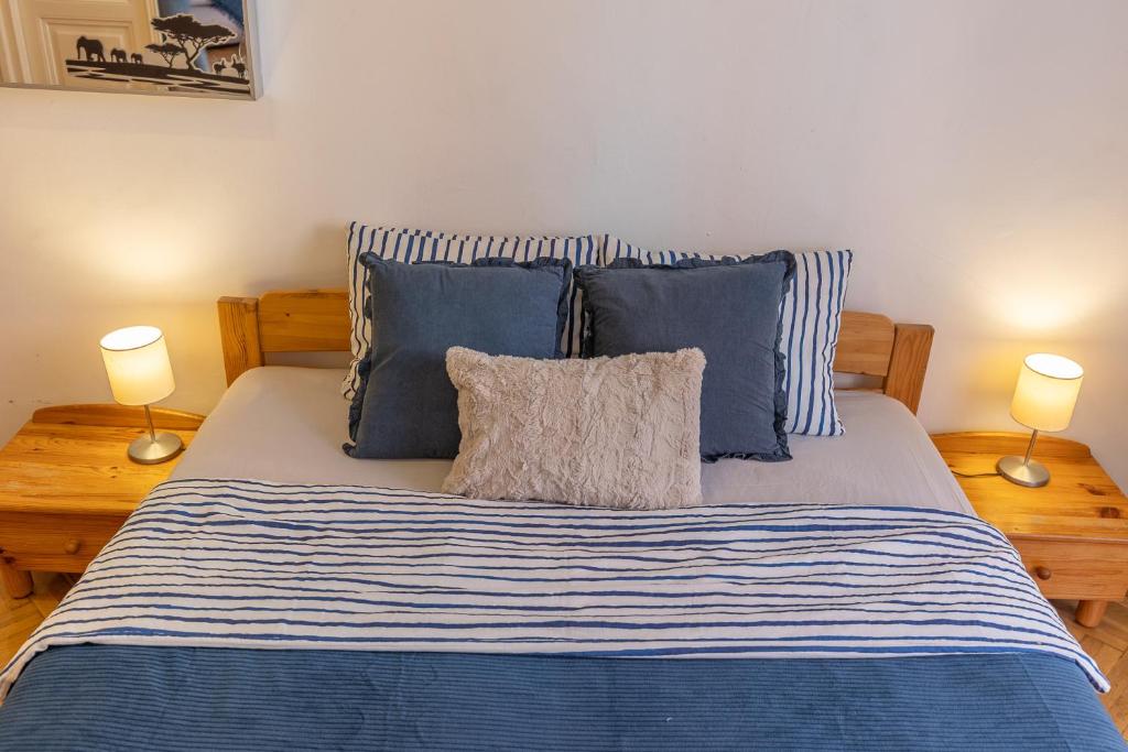 Posteľ alebo postele v izbe v ubytovaní Ráday Corner Apartment