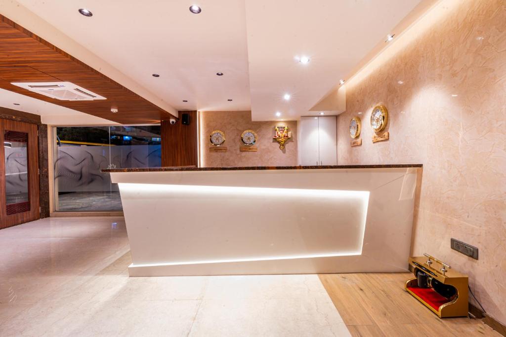 Kuchyň nebo kuchyňský kout v ubytování Treebo Premium Heritage Grand -Majiwada Thane