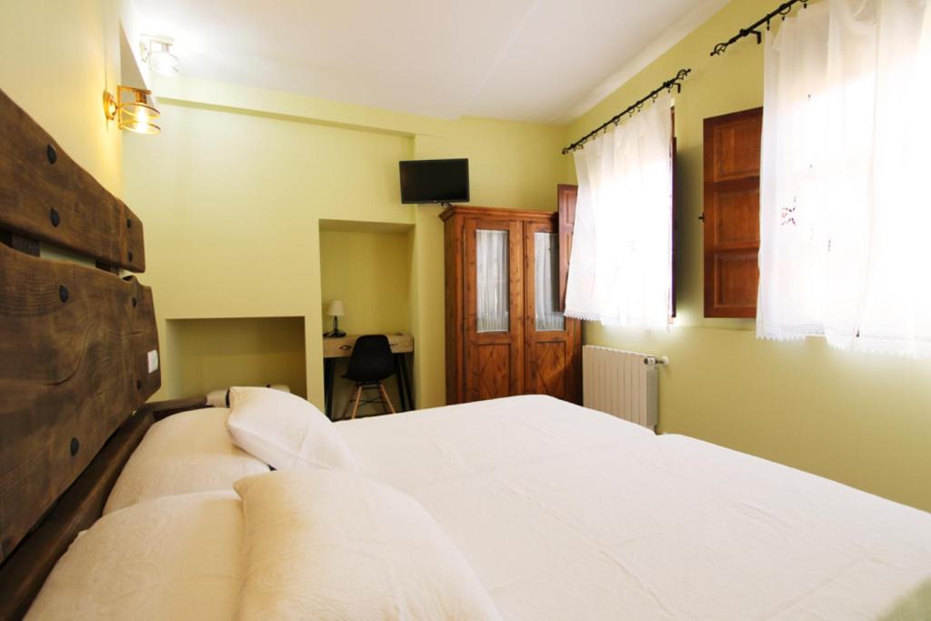 Postel nebo postele na pokoji v ubytování Hotel Rural Frías