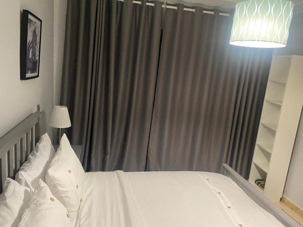 Postel nebo postele na pokoji v ubytování Appartement de LUXE Marina SAIDIA avec vue sur PISCINE Résidence TAMARIS