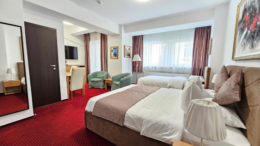 Postel nebo postele na pokoji v ubytování Bucur Accommodation