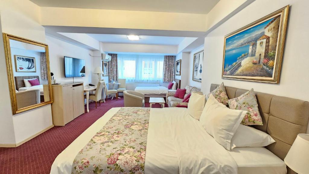 Postel nebo postele na pokoji v ubytování Bucur Accommodation