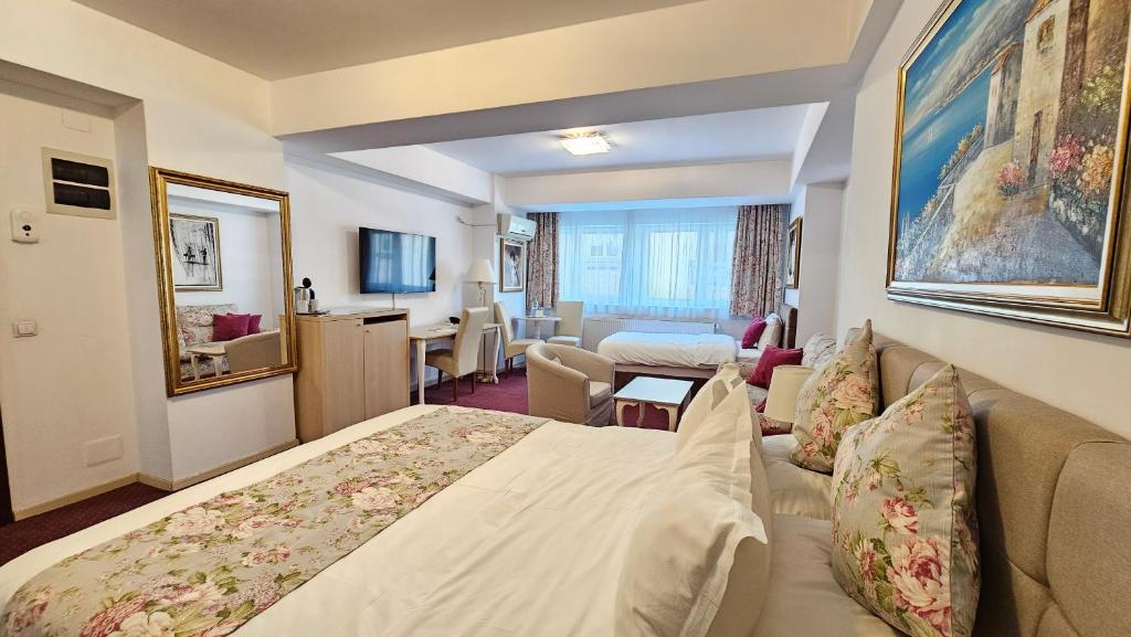Postel nebo postele na pokoji v ubytování Bucur Accommodation