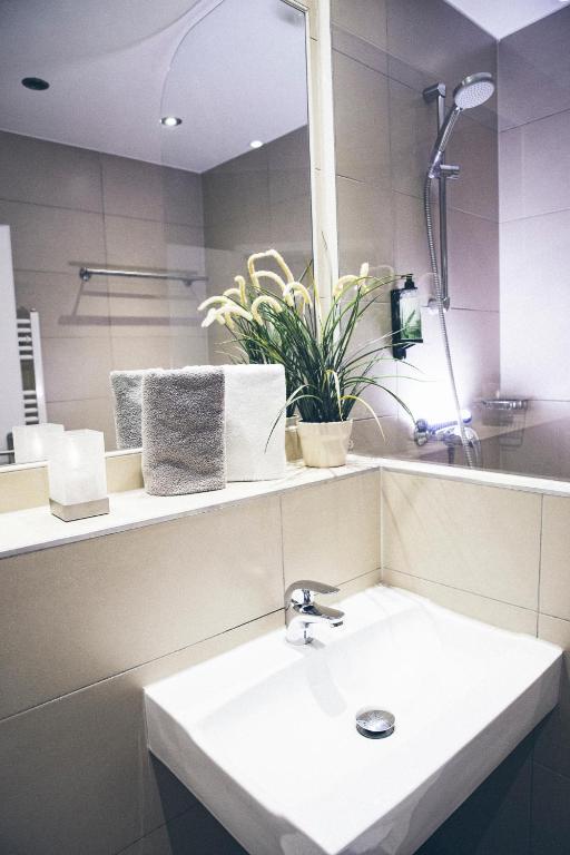 Koupelna v ubytování Gartenstadt Hotel