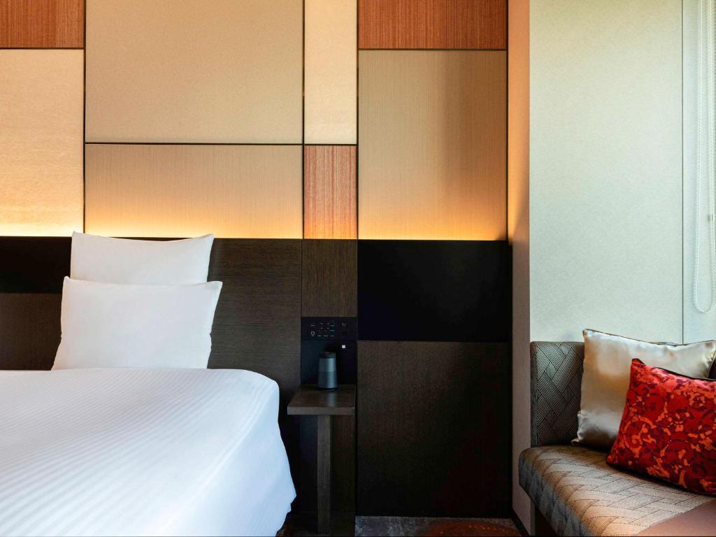 Postel nebo postele na pokoji v ubytování Pullman Tokyo Tamachi