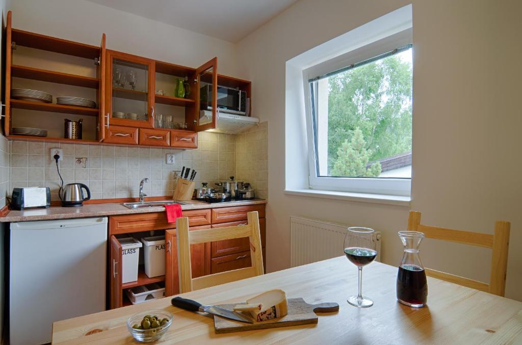 Kuchyň nebo kuchyňský kout v ubytování Apartment Marketa