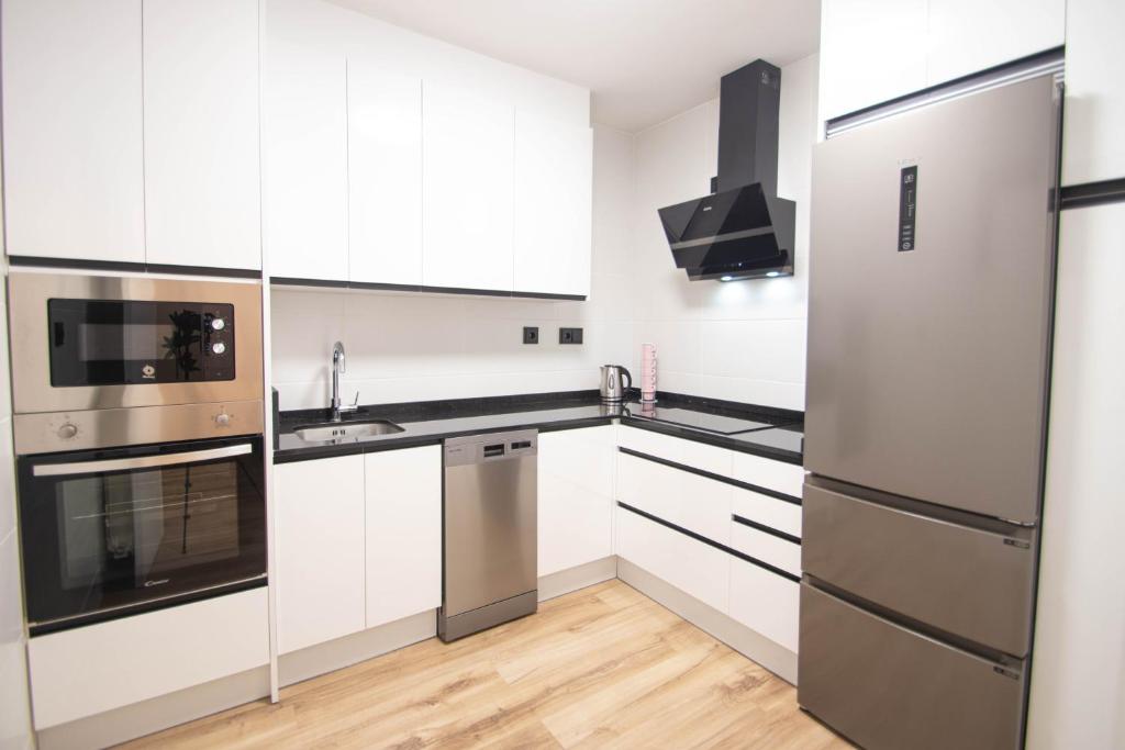 Kuchyňa alebo kuchynka v ubytovaní Elvira 54 Apartment