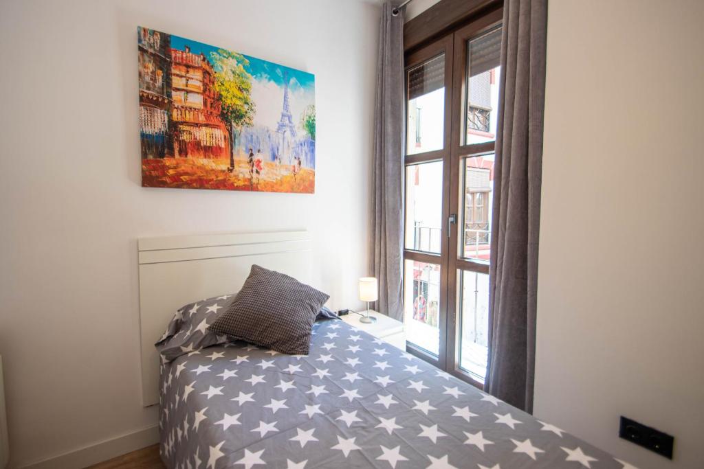 Posteľ alebo postele v izbe v ubytovaní Elvira 54 Apartment