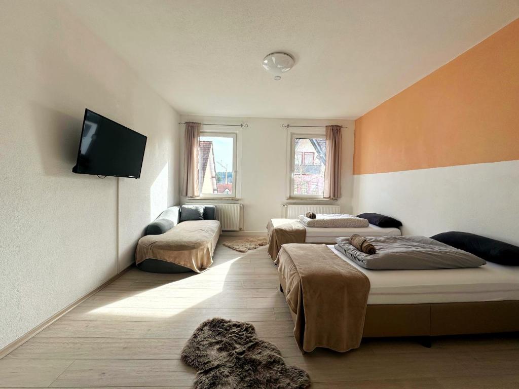 Кровать или кровати в номере Cozy Vacations Home in the Black Forest