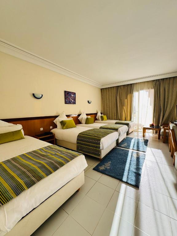 Ένα ή περισσότερα κρεβάτια σε δωμάτιο στο Hotel Idou Tiznit