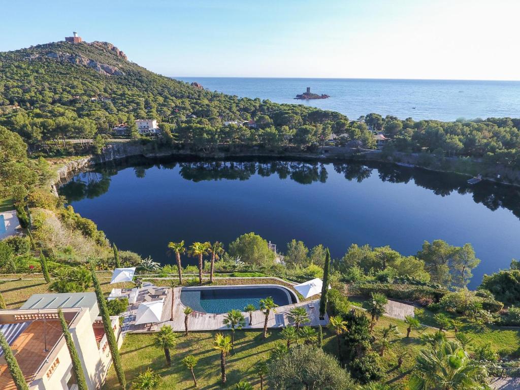 arial view of a large lake with a resort at Villa ALFONSA in Saint-Raphaël