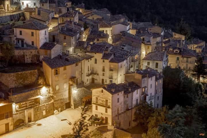 a city at night with a bunch of buildings at RESIDENCE GRAN SASSO in Pietracamela