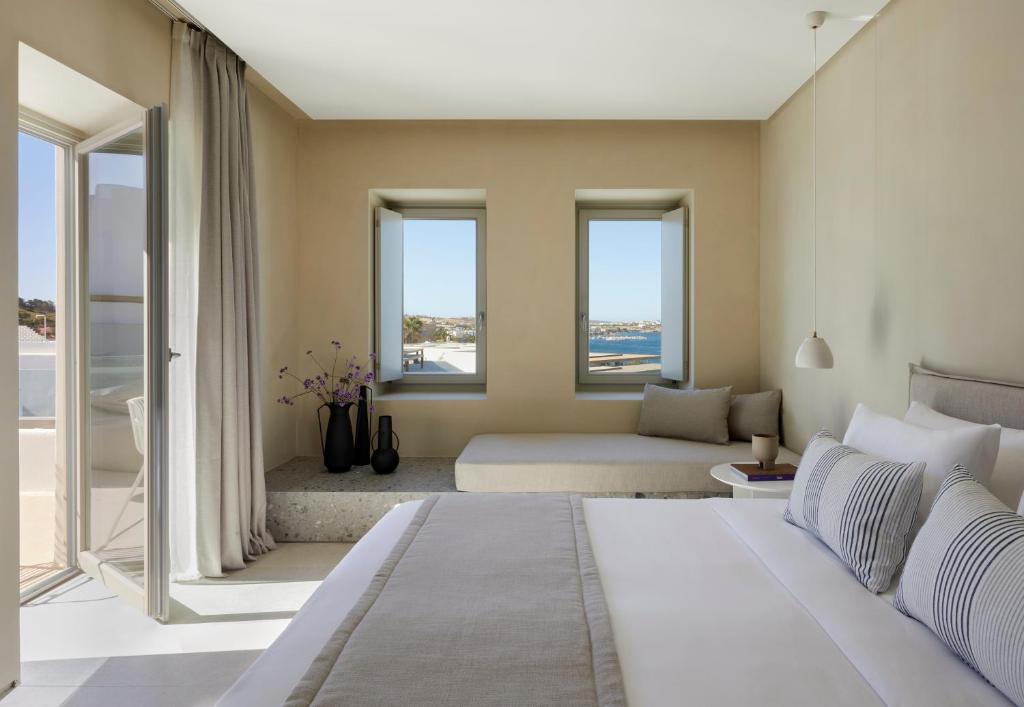 Voodi või voodid majutusasutuse PAROCKS Luxury Hotel & Spa toas