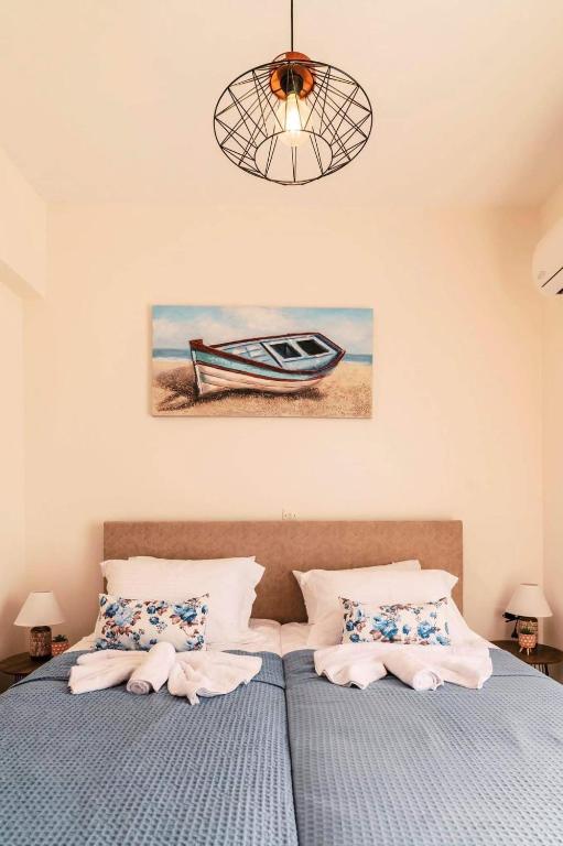 Postel nebo postele na pokoji v ubytování INFINITY BLU VILLA