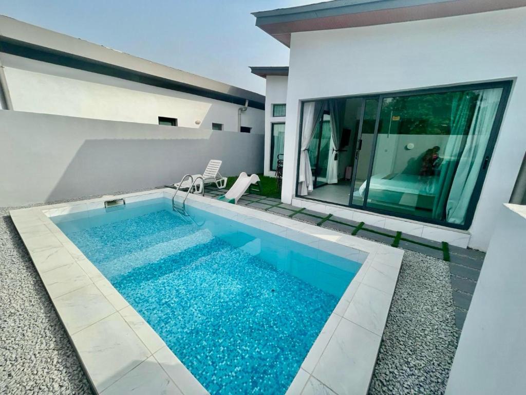 Bazén v ubytování Les merveilles d’assinie nebo v jeho okolí