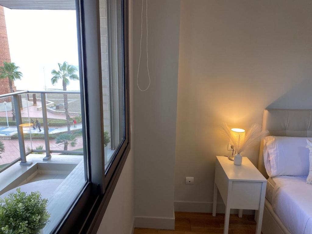 Posteľ alebo postele v izbe v ubytovaní Playa Pacífico Apartment