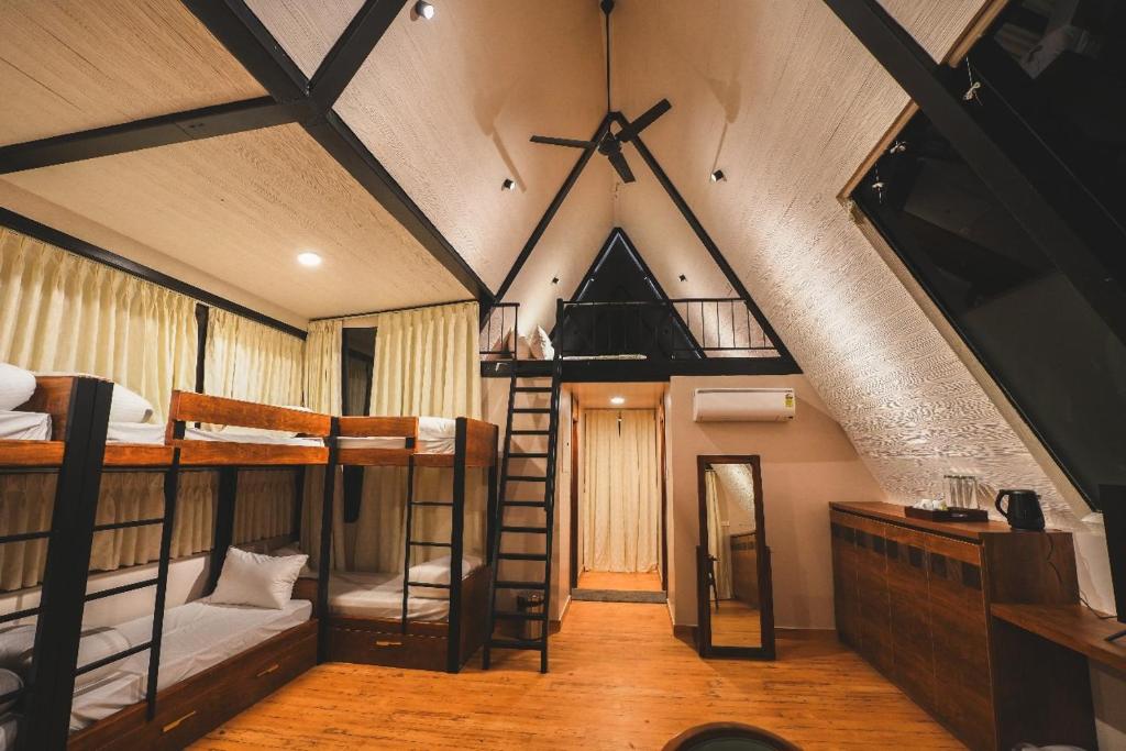 Postel nebo postele na pokoji v ubytování Inika