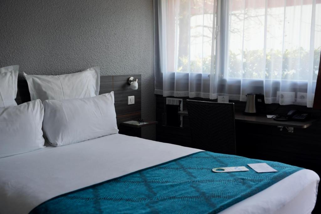 Postel nebo postele na pokoji v ubytování Sure Hotel by Best Western Biarritz Aeroport