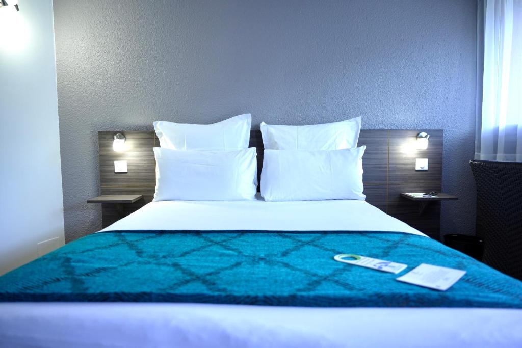 Postel nebo postele na pokoji v ubytování Sure Hotel by Best Western Biarritz Aeroport