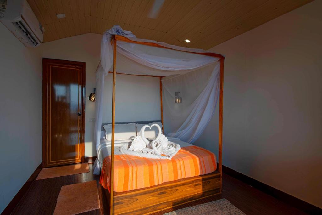 Postel nebo postele na pokoji v ubytování Agonda Serenity Resort