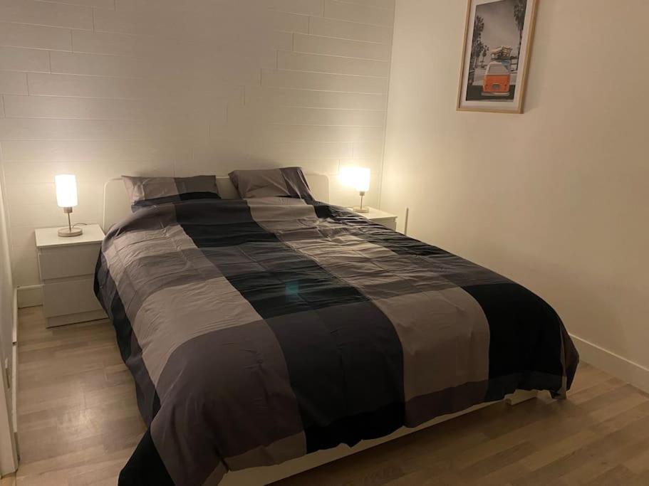 Postel nebo postele na pokoji v ubytování Chez Papou