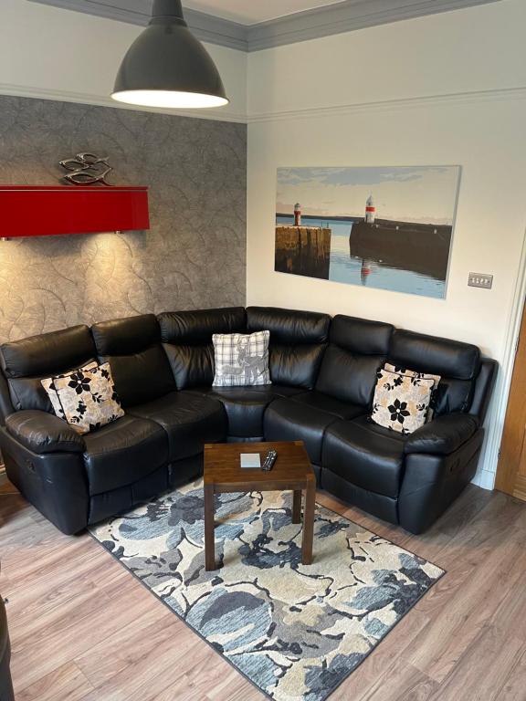 Posezení v ubytování Owlswood Apartments