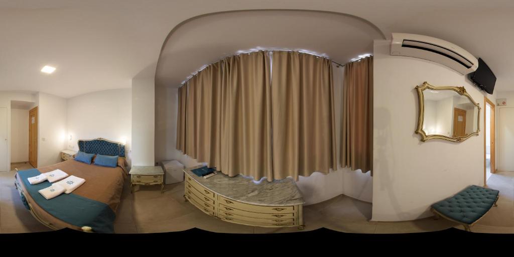 Cama o camas de una habitación en Hotel Marítimo Urban