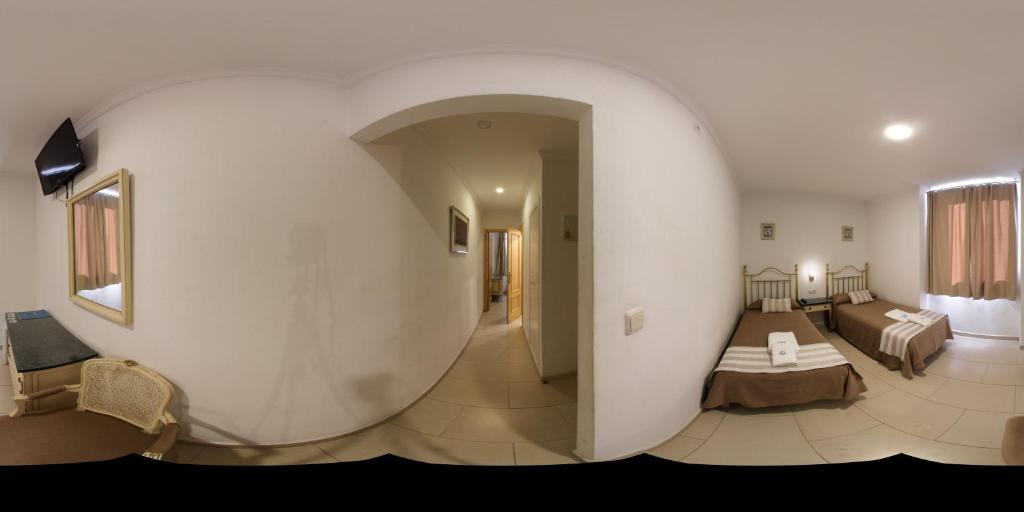 Cama o camas de una habitación en Hotel Marítimo Urban