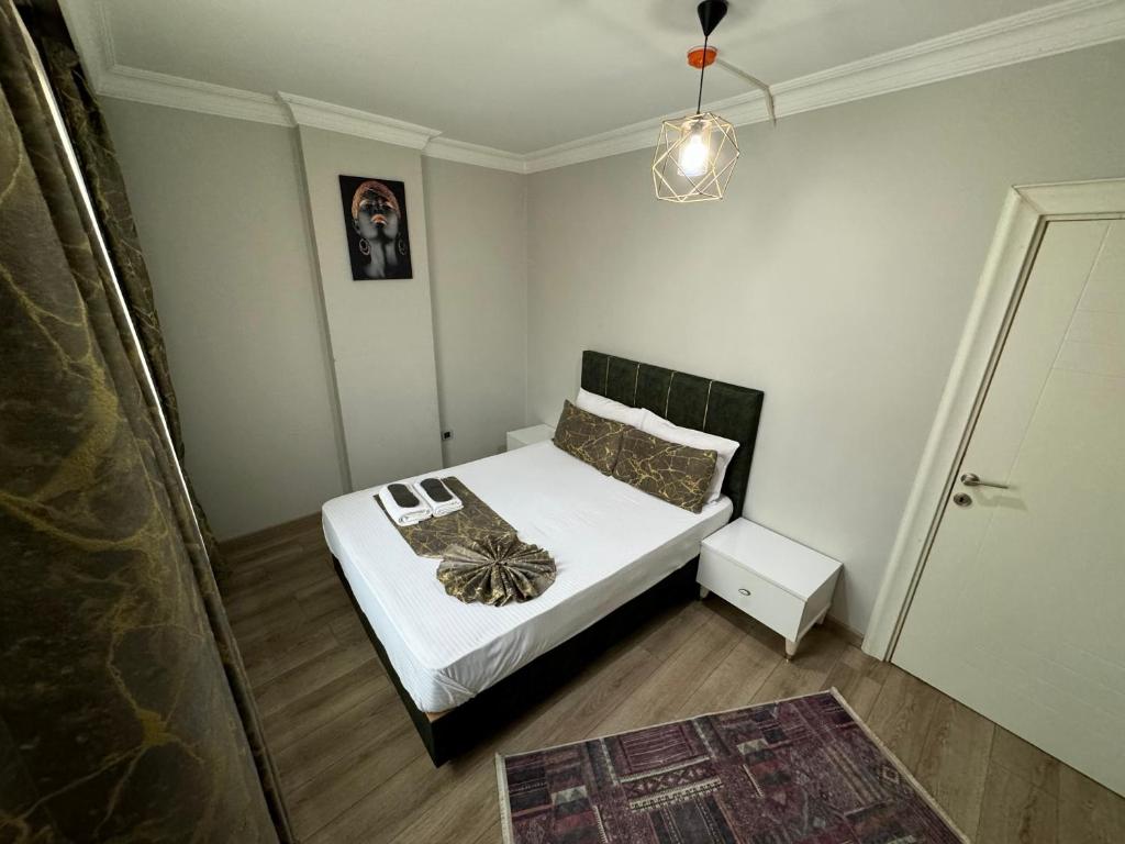 Postel nebo postele na pokoji v ubytování The Pashaam Suit Bakırköy