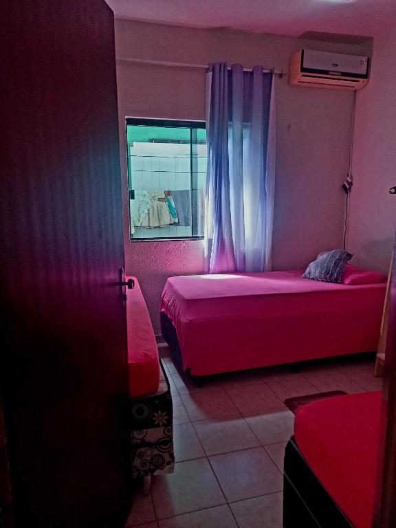 Postel nebo postele na pokoji v ubytování Verdes Hostel Palmas-TO
