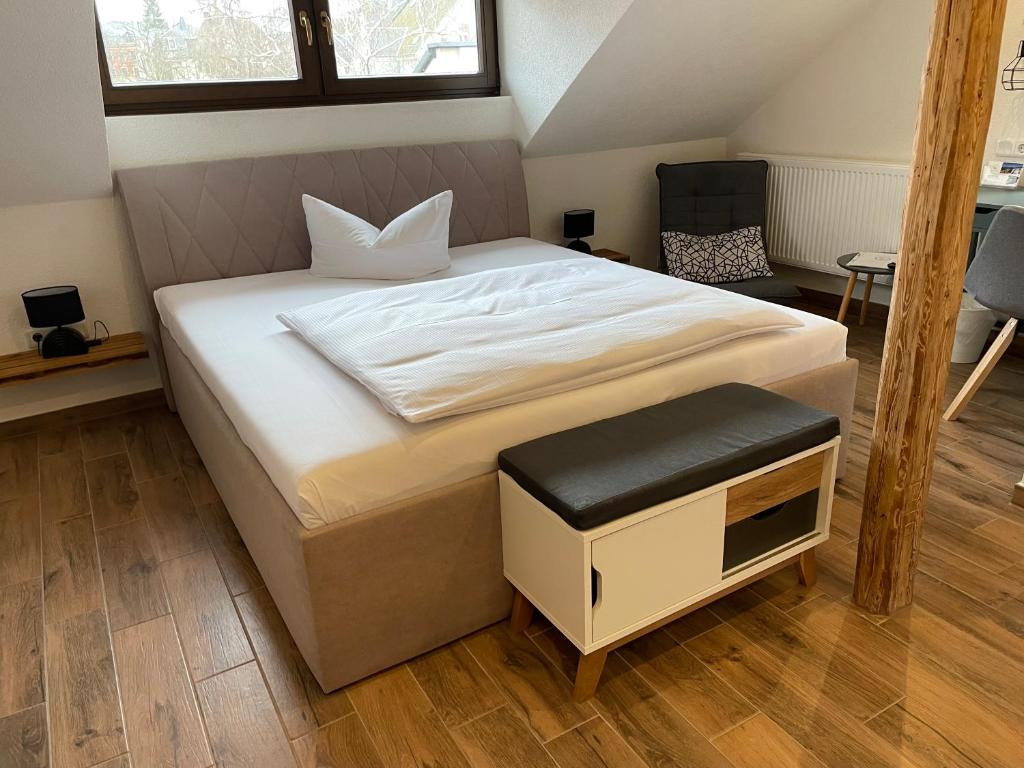 Tempat tidur dalam kamar di Avenue Das Gästehaus