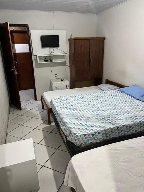 Postel nebo postele na pokoji v ubytování Pousada Água Viva
