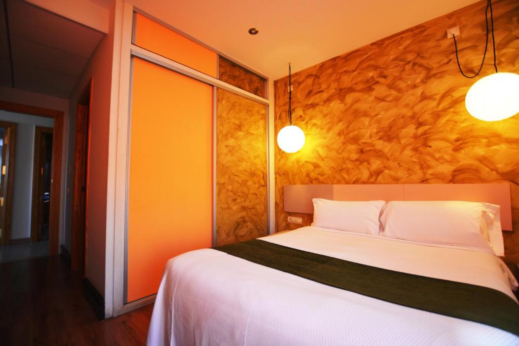 Postel nebo postele na pokoji v ubytování Hotel Posada Guadalupe