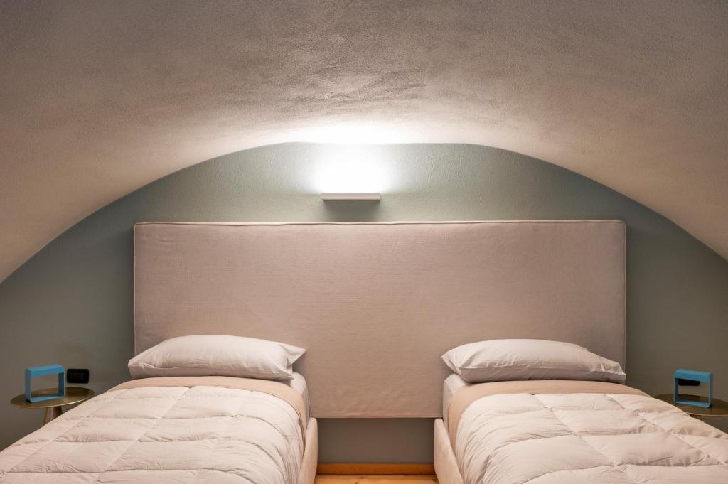 Postel nebo postele na pokoji v ubytování Villa Raggi