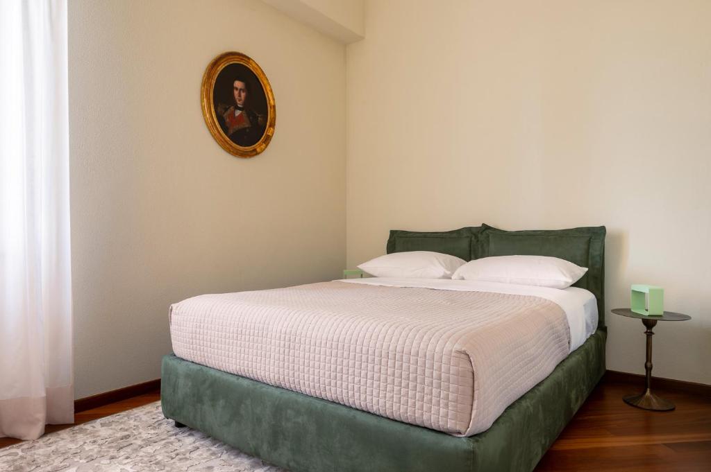 Postel nebo postele na pokoji v ubytování Villa Raggi